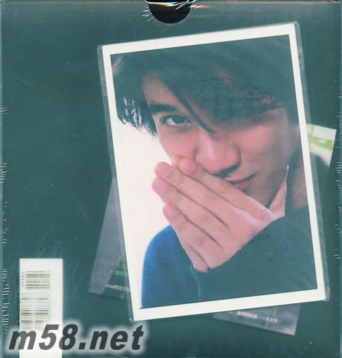 純屬意外(2書+VCD)寫真專輯背面圖片